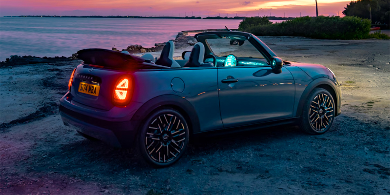2025 MINI Cooper S Convertible on a beach at sunset