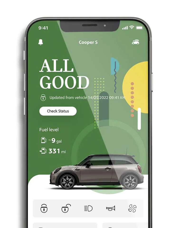 Smartphone with MINI App vehicle status information on its screen. | Tom Bush MINI in Jacksonville FL