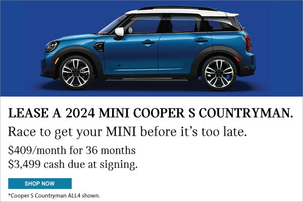 Full left view of MINI Countryman on blue background